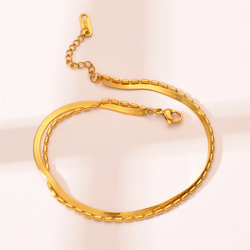 Europa y los Estados Unidos ventas transfronterizas calientes de doble capa de acero de titanio cadena de hueso de serpiente no desvanecer pulsera de alta gama para mujeres joyas de mano
