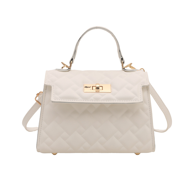 Este año, la popularidad de la cerradura casual 2024 nueva moda de invierno de diseño simple, bolso de hombro, bolso de diamante