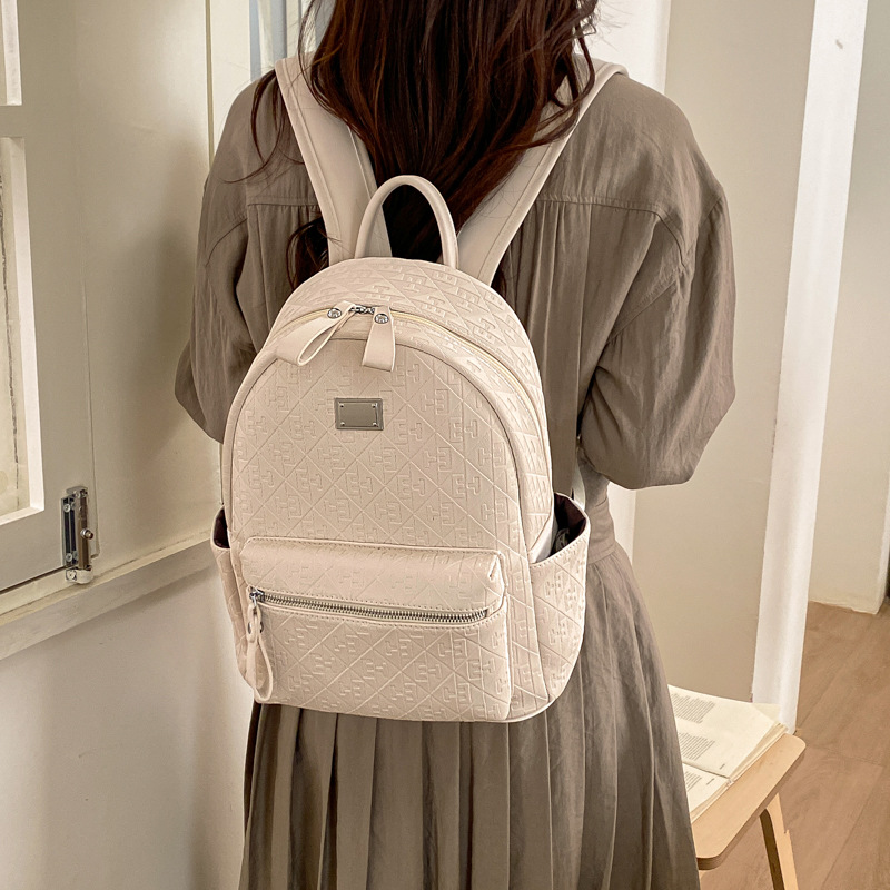 Mochila de moda coreana para mujeres simple color sólido mochila de viaje de gran capacidad 2026 nueva mochila de viaje al trabajo