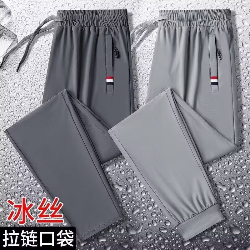 Camisas y menos ropa, pantalones de seda de hielo, pantalones de chándal elásticos finos de verano, pantalones rectos de hombre con cremallera de bolsillo al por mayor al por mayor