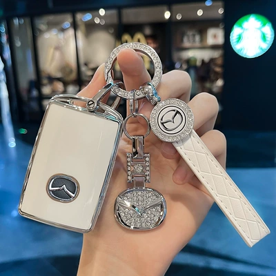 Suitable for Mazda 3 Car key bag - type-c-three-button-white-key-cover-diamond-ring-car-logo-leather-buckle-diamond-car-logo