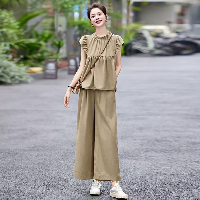 Модный повседневный женский летний комплект 2025 года, новая корейская версия, свободный элегантный тонкий дышащий топ с короткими рукавами и широкие брюки, комплект из двух предметов