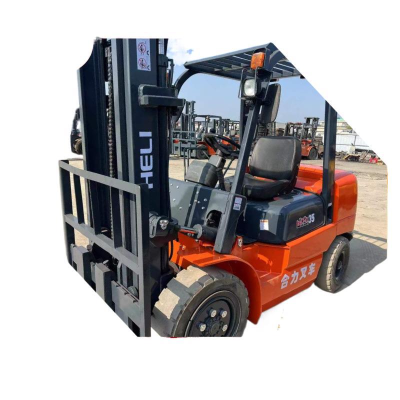 Fábrica in situ para manejar carretillas elevadoras diesel de combustión interna 2 toneladas 3 toneladas 5 toneladas 7 toneladas elevadoras hidráulicas de conducción