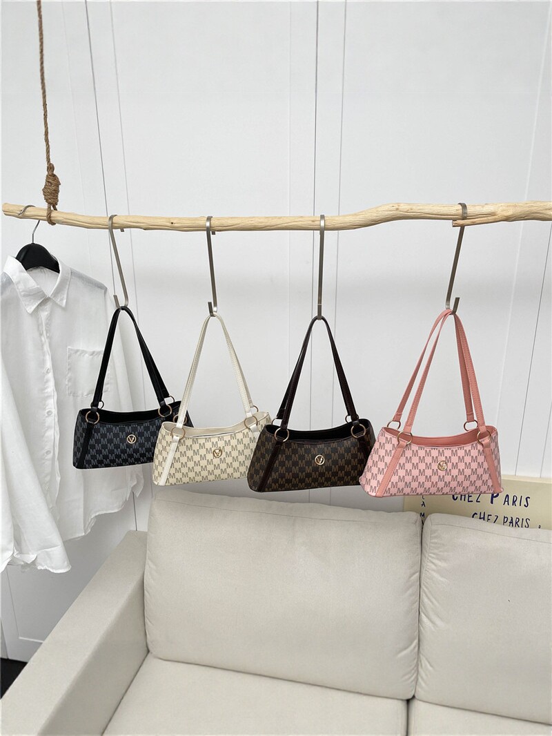 Bolso de mujer 2026 nueva letra impresa bolso de brazo de mujer bolso de hombro de viaje universal bolso de moda simple