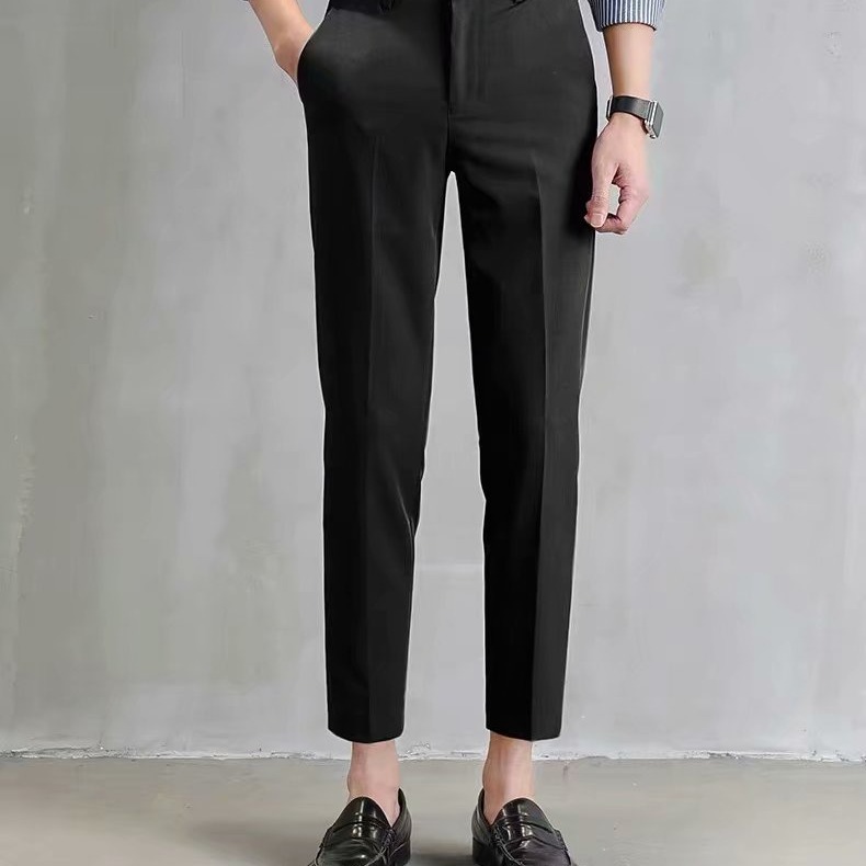Los fabricantes de origen pantalones pequeños negros pantalones cortos para hombres, pantalones de traje ajustados rectos con sentido de tendencia, pies pequeños, versión coreana casual