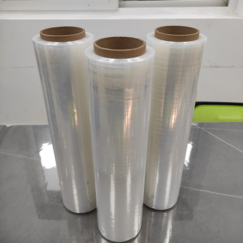 Fábrica al por mayor transparente recubierto PE bobina de película estirable bandeja de película recubierta mano película de embalaje de plástico