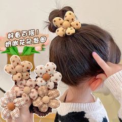 子供の乳のカレーの色の新型の頭の紐の赤ちゃんの布芸の花のシュシュの女の子は髪の皮の筋の頭を傷つけません。