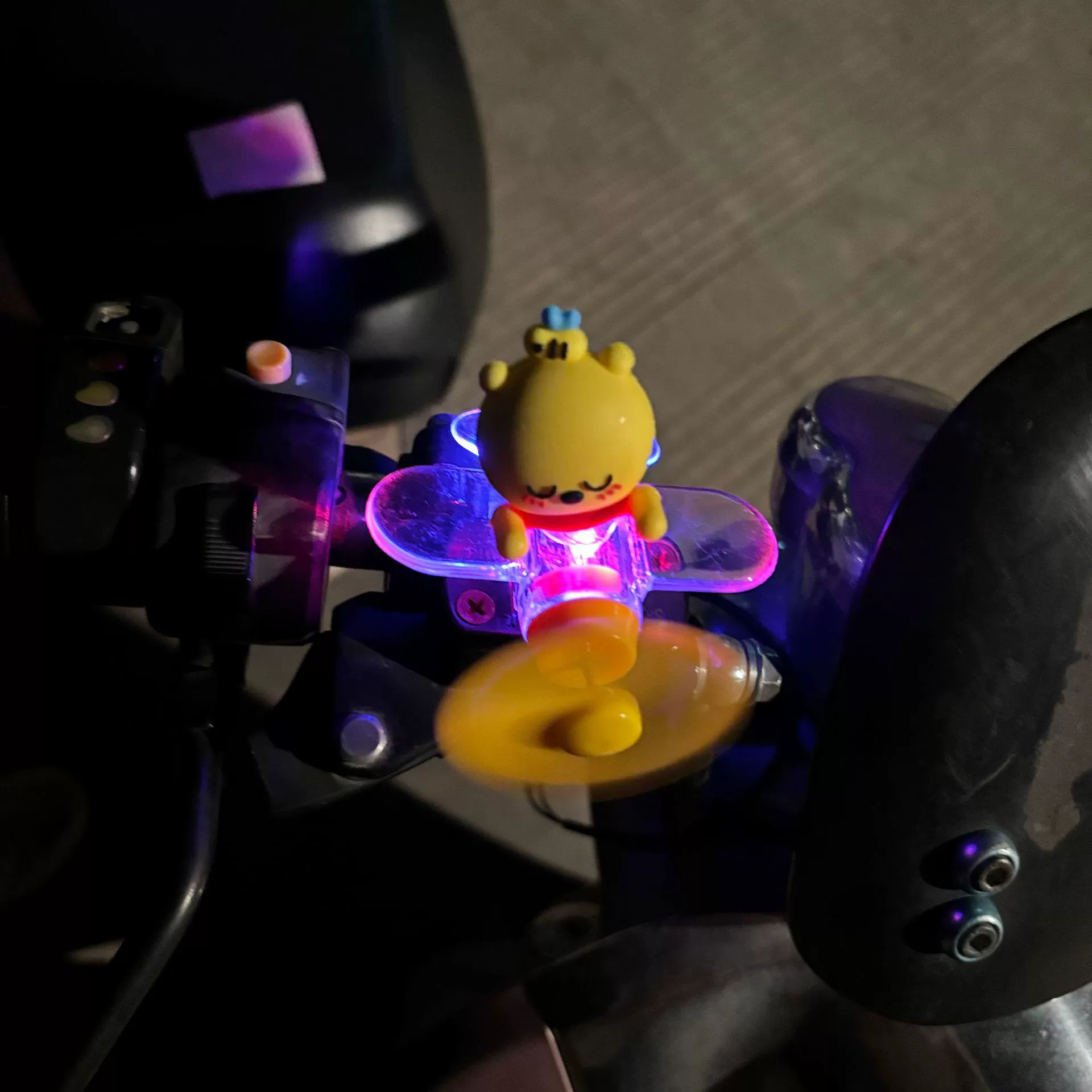 Electric car, glowing airplane, rotating decorations, generating electricity