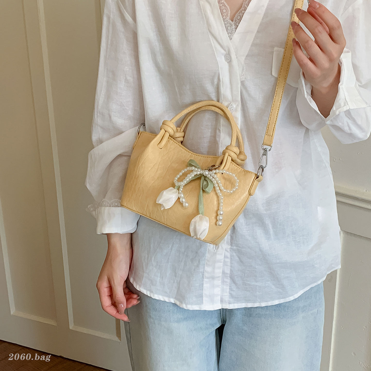 Bolsas plegadas coreanas femeninas super caliente de un solo hombro cubo de agua para viajar 2026 bolsas de mochila populares nuevos nichos de verano