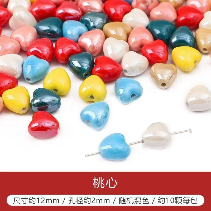 Cuentas de cerámica flor cuadrada estrella de cinco puntas pequeña flor de ciruelo trébol de cuatro hojas pequeño elefante pequeño conejo de jade color mixto cuentas de agujeros rectos cuentas hechas a mano