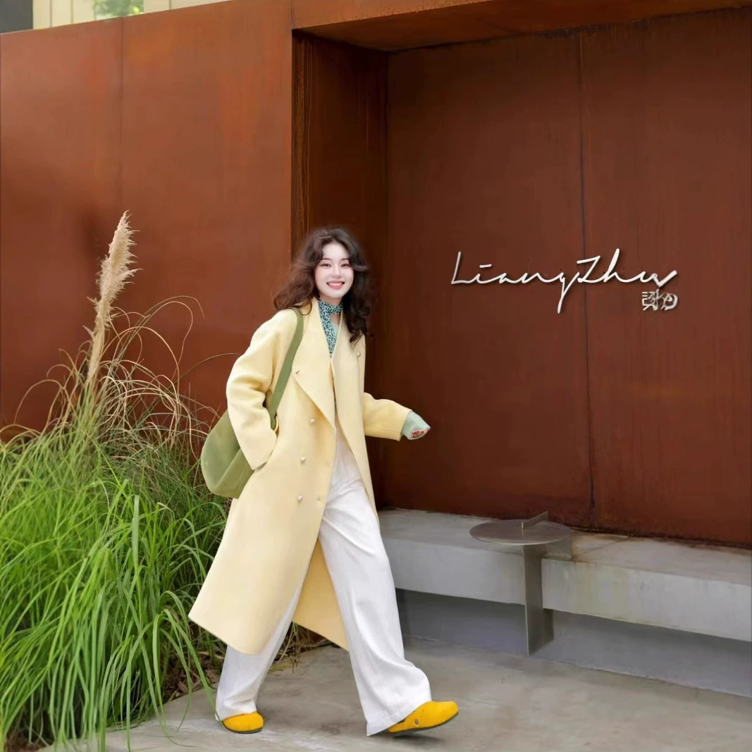 Модное женское двубортное пальто свободного кроя с воротником-стойкой из двусторонней шерсти на осень и зиму 2025 года.