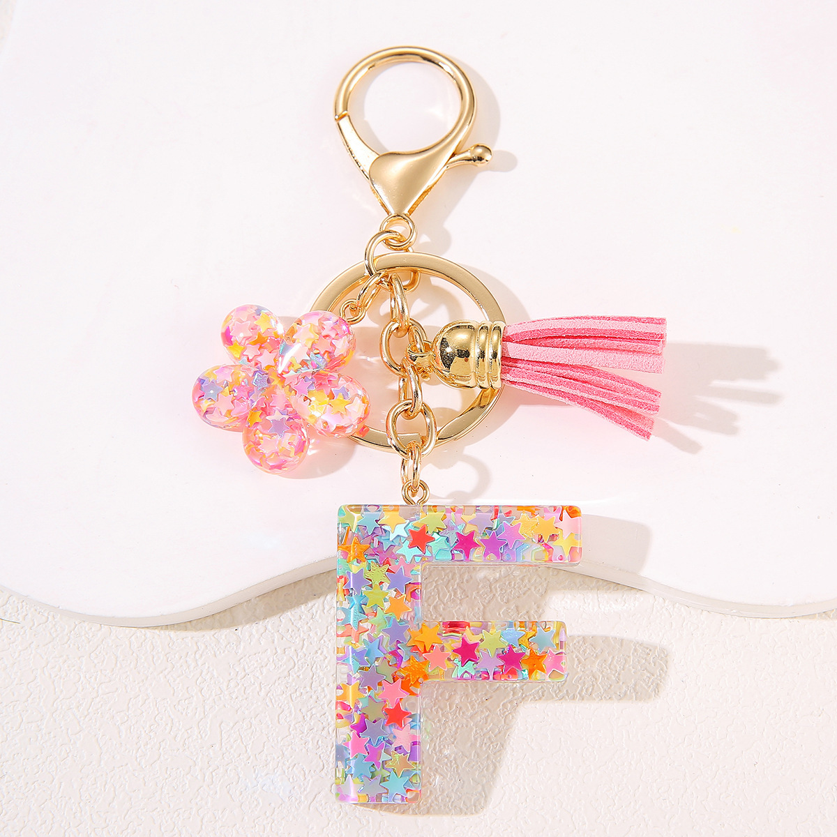 Un nuevo llavero flor de goteo de goma esquinilla 26 letras bolsos colgante llavero accesorios Yiwu