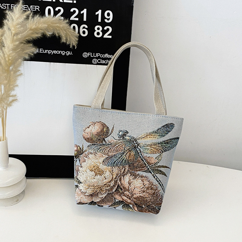 新しいファッショナブルで多用途なカジュアルな気質の女性のキャンバス両面ゴールデンシルクジャカード刺繍蝶ハンドバッグママバッグ|undefined