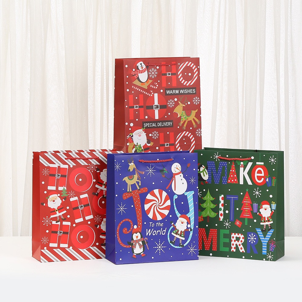圣诞卡通印花白卡手提袋节日派对礼品袋购物包装袋节日糖果袋批发