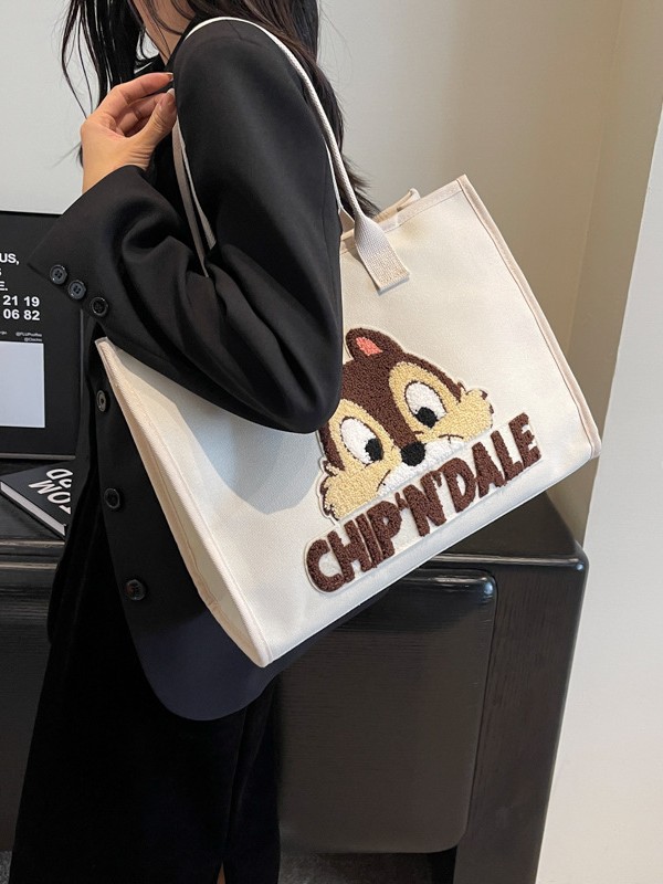 Bolsa de lona de gran capacidad para mujeres 2025 nuevo estilo urbano minimalista de moda de dibujos animados portátil de hombro para viajar bolsa