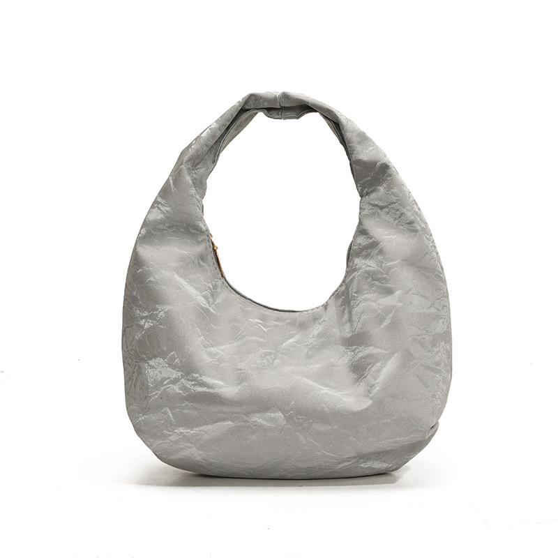 Bolso de mano plegado para mujeres 2025 primavera y verano nuevo nicho de moda bolso de hombro pequeño bolso de media luna fresco