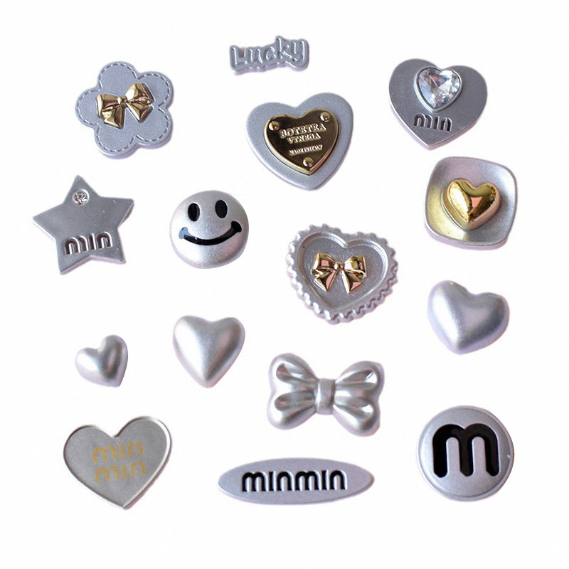 人気メッキ愛蝶ネクタイアクセサリー高級感シルバーグレー笑顔ヘアアクセサリー材料卸売り