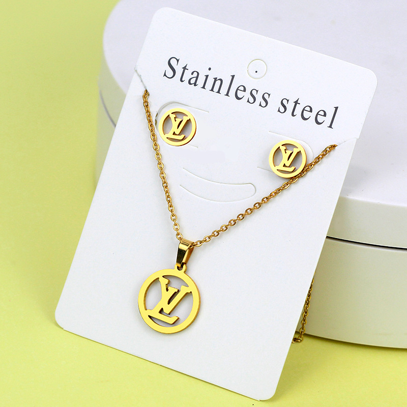 Conjunto de collar de pendientes de oro de acero inoxidable europeo y americano, collar de mariposa de amor de diamante, colgante, cadena de clavícula, fábrica al por mayor