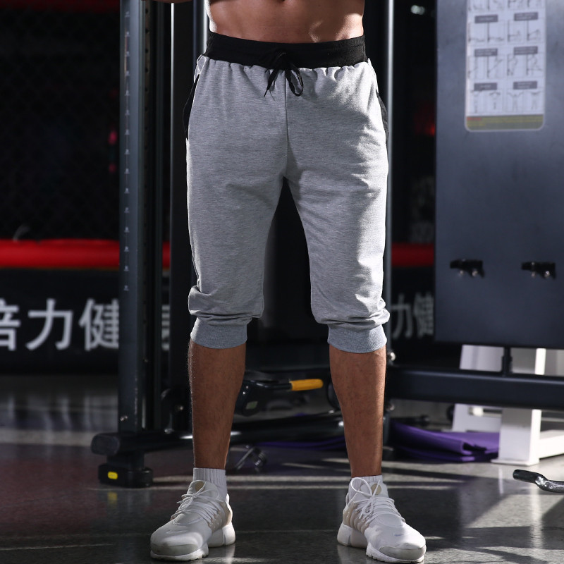 Nuevo 2022 pantalones casuales para hombres de color sólido sin planchar pantalones de cinco puntos moda urbana Pantalones deportivos de cintura media