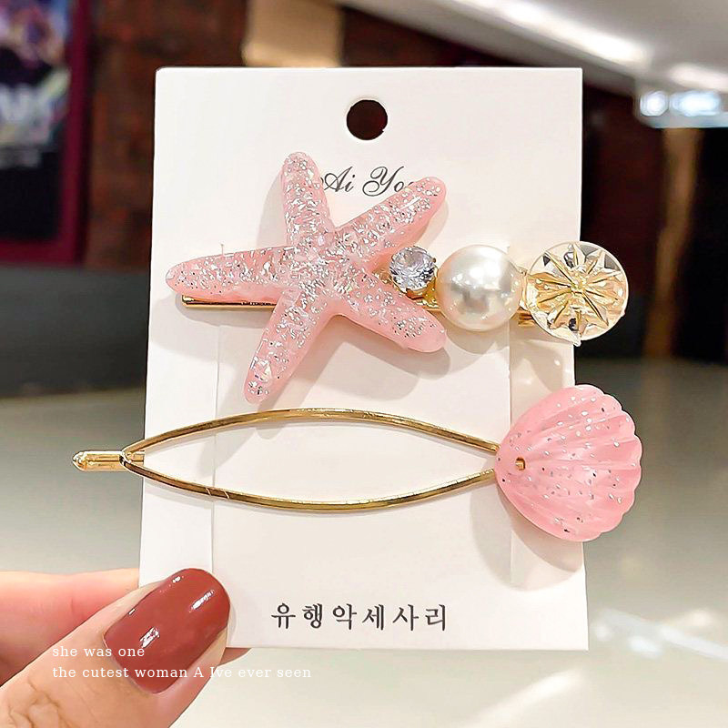 1#Conjunto rosa, estrella de mar de unos 6 cm, concha de unos 7 cm.