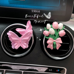 蝶結びのチューリップの車のアロマアロマの香りが香ばしい石の花の車の風口を広げて車内の置物の卸売りを飾ります。