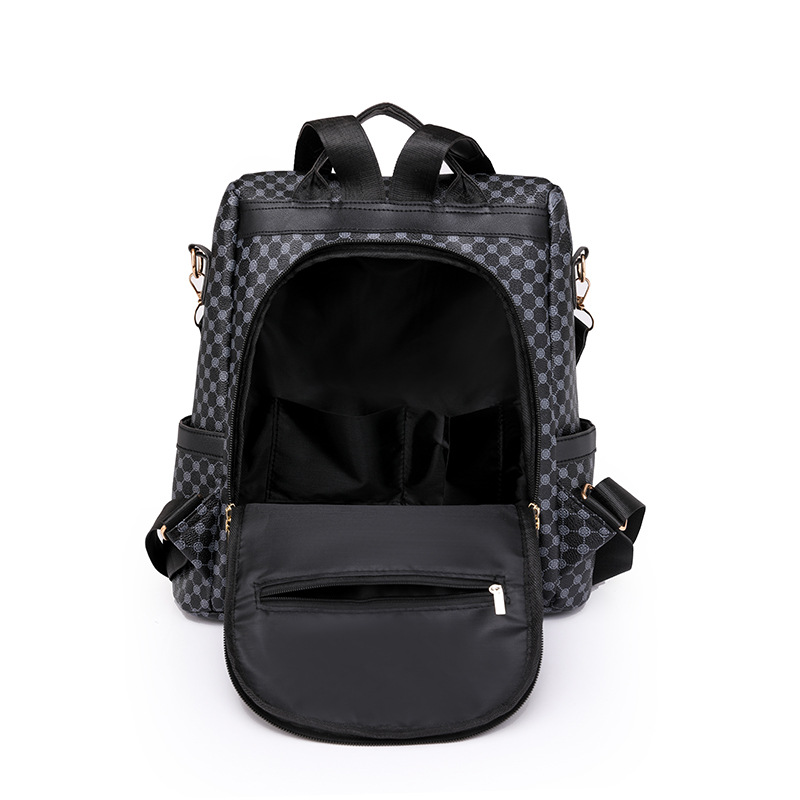 Comercio exterior al por mayor 2023 nueva versión coreana de las señoras de cuero suave mochila antirrobo moda contraste color bolsa de viaje al aire libre de doble uso