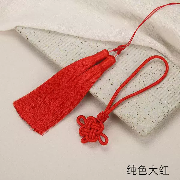 Double spelled tassels in red