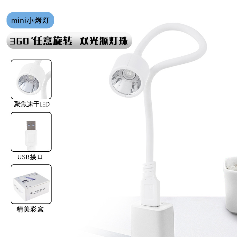 Fábrica al por mayor Mini lámpara de uñas pequeña máquina de fototerapia portátil lámpara de cocción de mano lámpara de curado UV de uñas