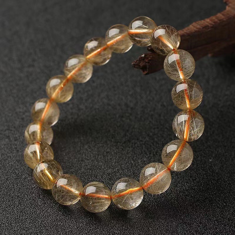 Famous capital crystal natural Rutilated Bracelet Blond Titanium Lap Hand string wholesale direct deal