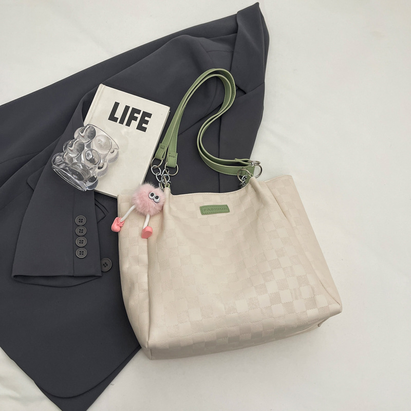 Bolsa de hombro a cuadrillas de alto nivel 2024, nueva bolsa de viaje simple de gran capacidad para estudiantes universitarios.