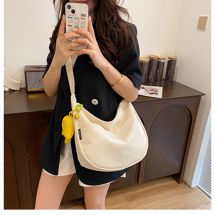 Simple solid-color canvas bag 2024 new style Japanese large-capacity single-shoulder dumpling bag, versatile for school and commuting crossbody bag undefined
