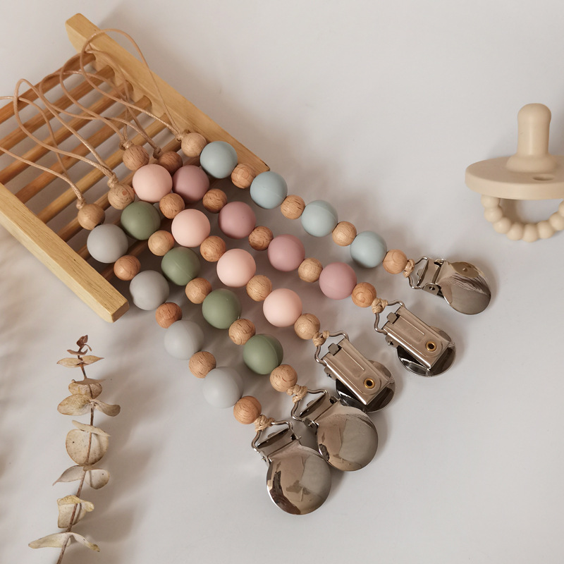 Nuevo bebé suministros de silicona perlas Cadena de pezón calmante bebé DIY creativo mordedura molar cadena anti-caída