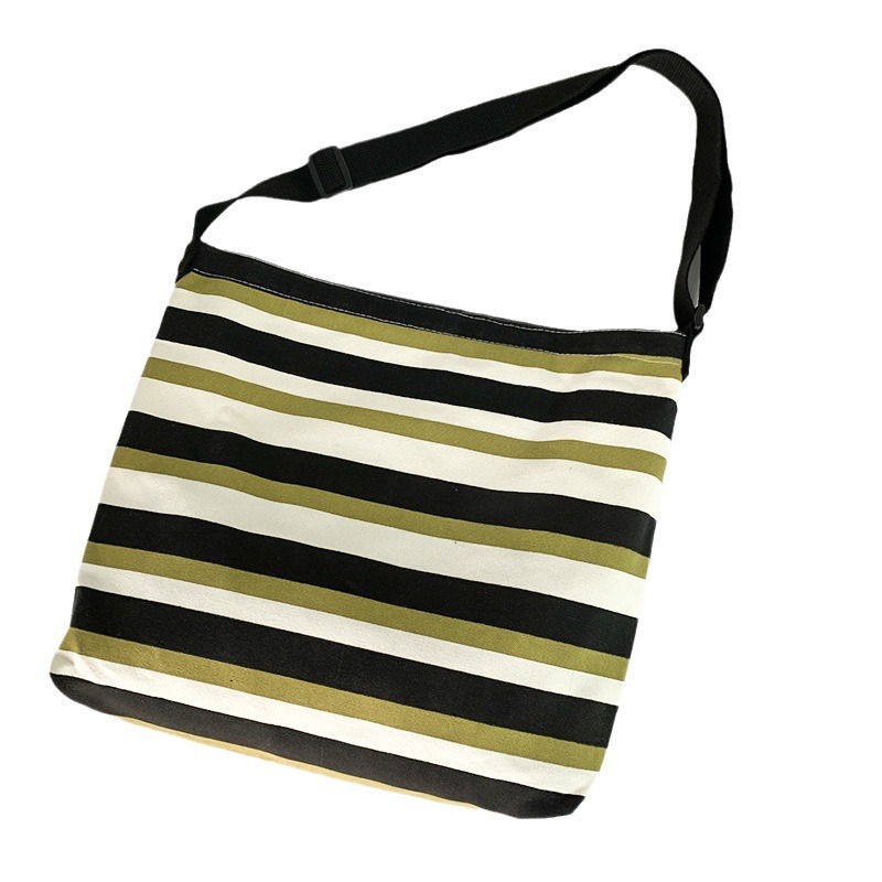 Nuevo Cruz-cuerpo bolsa de lona femenina de un solo hombro estudiante clase libro bolsa Bolsa de Comercio Exterior bolsa de la raya