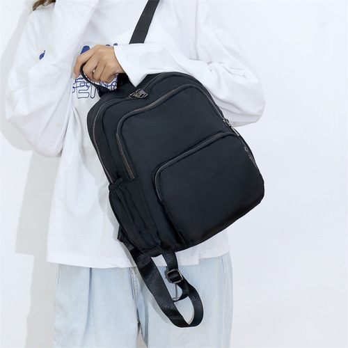 Casual minimalist daily travel backpack for women, lightweight and easy to carry, large capacity fashionable mom bag, waterproof nylon fabric bag