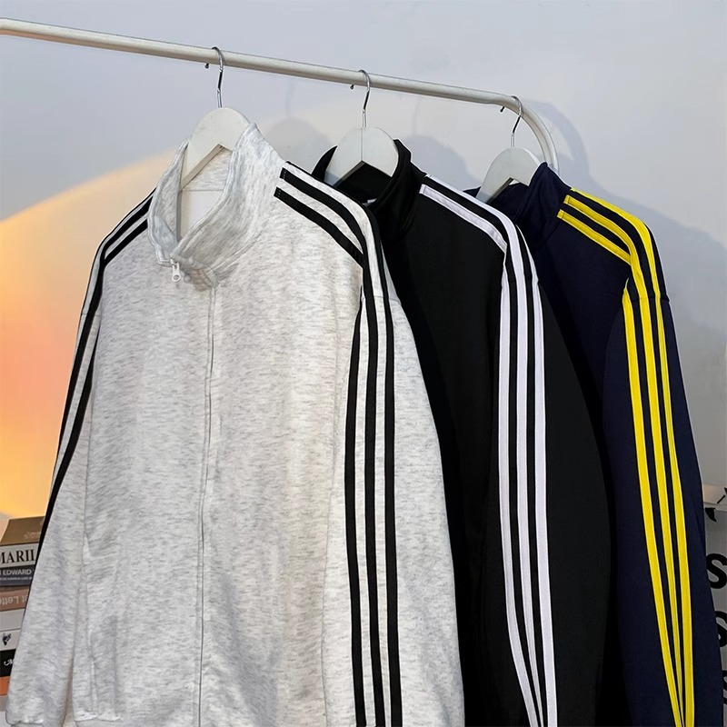 Primavera y otoño chaqueta de ropa deportiva para hombres y mujeres ocio tres barras chaqueta cardigan chaqueta de carrera al aire libre sudadera comercio exterior al por mayor transfronterizo