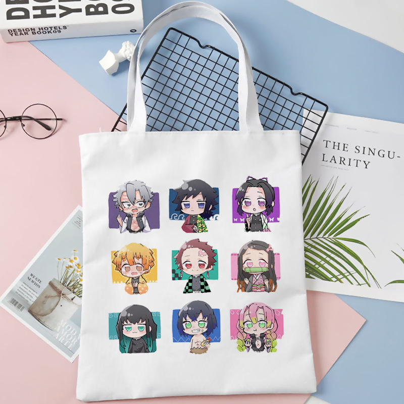Comercio exterior transfronterizo Demon Slayer impresa bolsa de lona Harjuku bolsa de hombro bolsa de compras portátil de moda para estudiantes