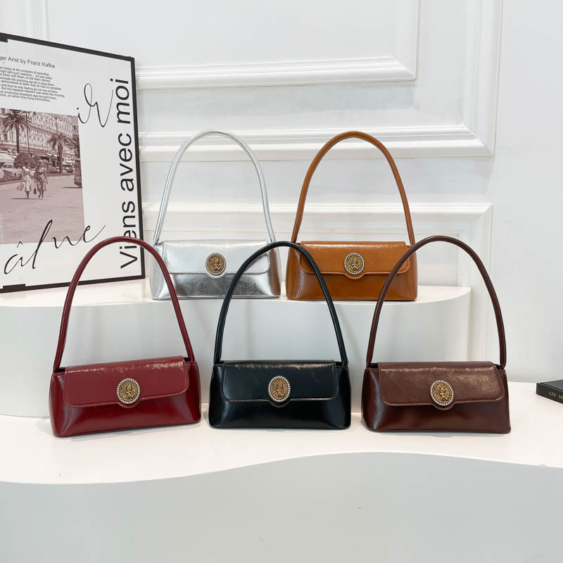 Este año, bolsas de brazo de moda populares 2025, bolsas de hombro de mujer retro de gran capacidad, bolsas de tendencia de estilo extranjero, bolsas pequeñas