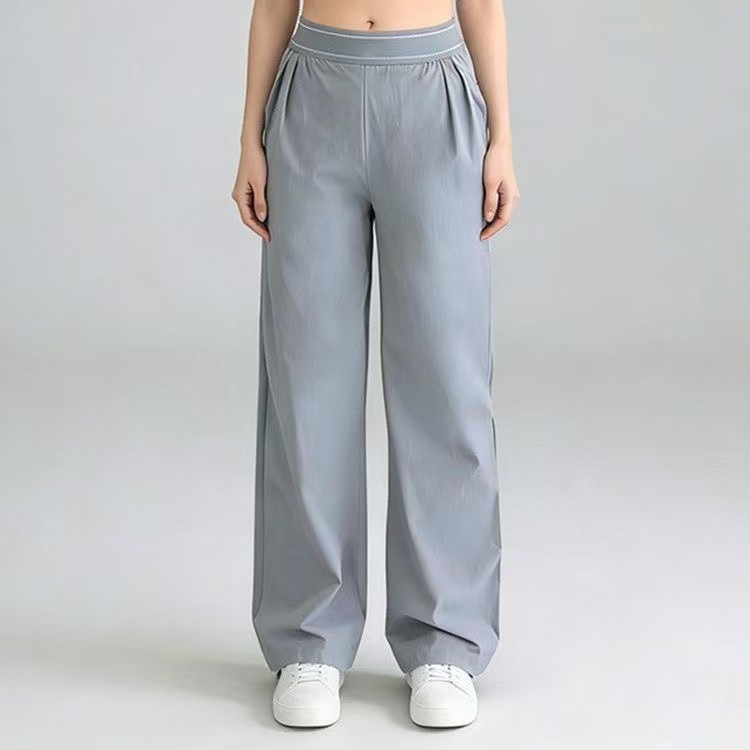 A10 pantalones de piernas largas de tejido rectas casuales cinturón elástico suelto deportivo femenino muestra piernas largas en stock image 7