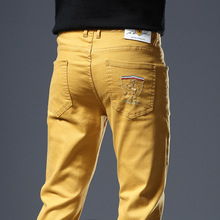 香港新款纯色刺绣休闲裤男青年潮牌个性修身小脚弹力休闲长裤子男