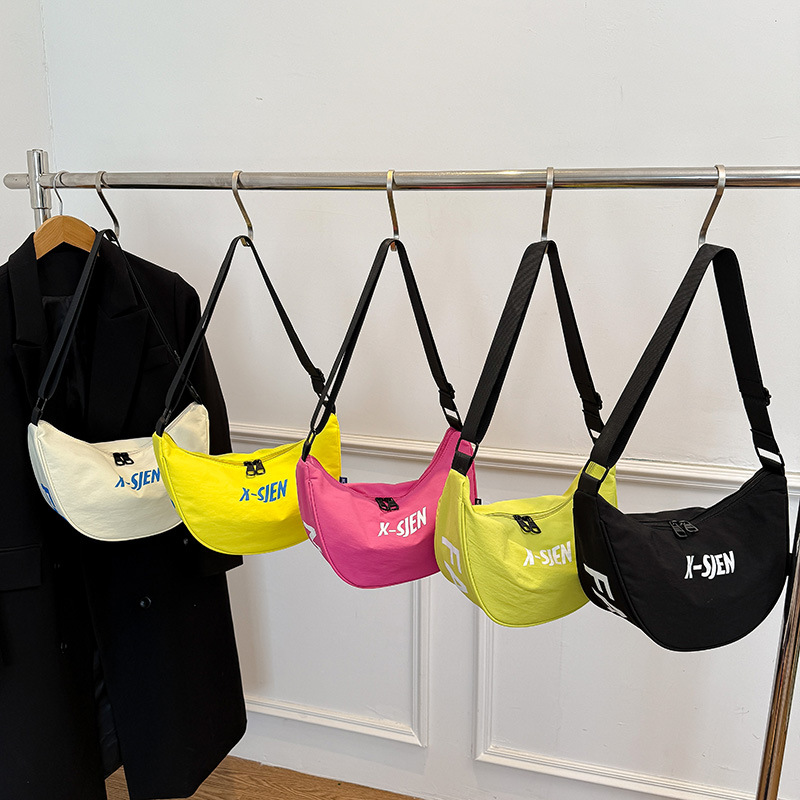 Moda coreana de moda para niños y niñas bolsas de饺os letras de aire extranjero de gran capacidad bolsas de mochila para niños nuevas bolsas para niños