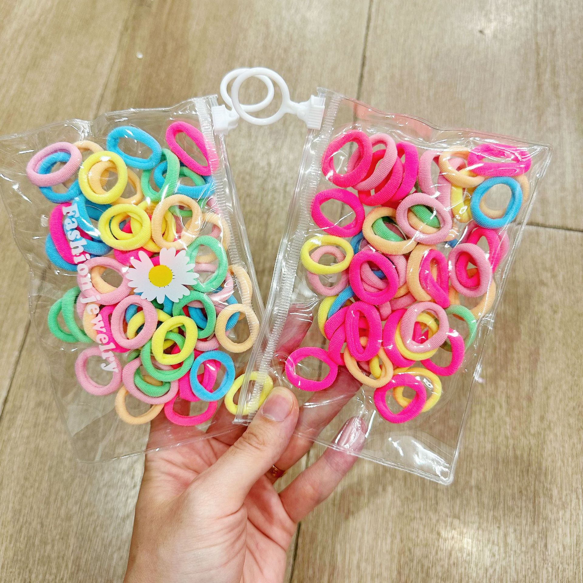 Mini cabeza de princesa en caja, clip de agarre pequeño, clip de flequillo, horquilla rota en la frente, banda elástica para niños, no daña el cabello, anillo del pulgar al por mayor image 98