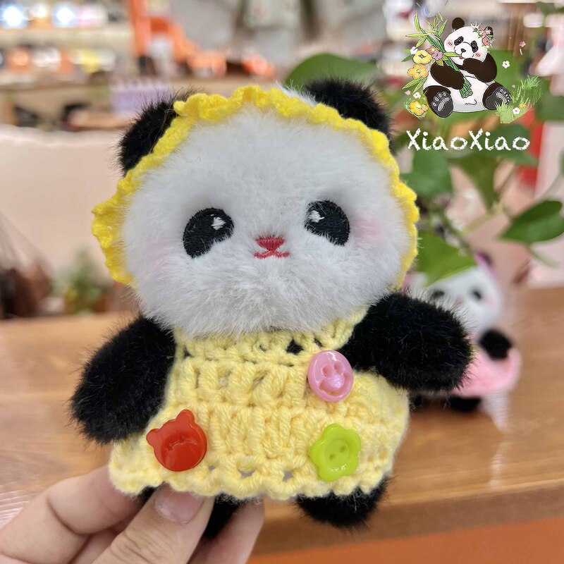 ネット赤かわいい萌えパンダストラップボタンのスカートパンダのぬいぐるみのブリーフケースにキーホルダーがついています|undefined