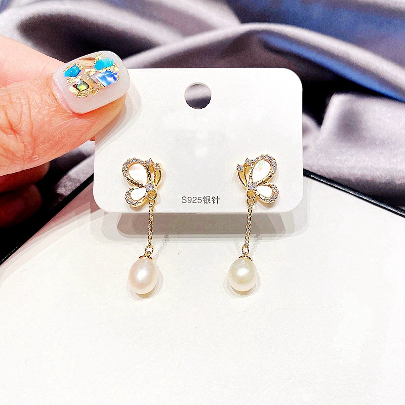 Nihaojewelry Korean Style Butterfly Pearl Tassel Copper Earrings Wholesale Jewelry display picture 4