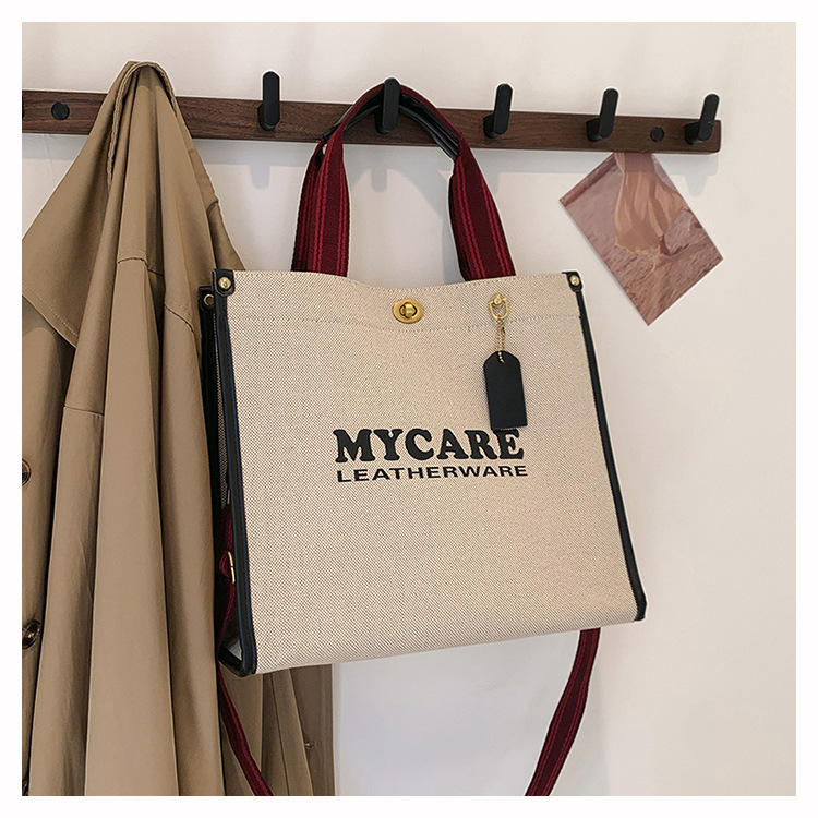 Bolsa de mano de lona de gran capacidad para mujeres 2024 nueva moda impresa letras mochilas bolsa de viaje casual