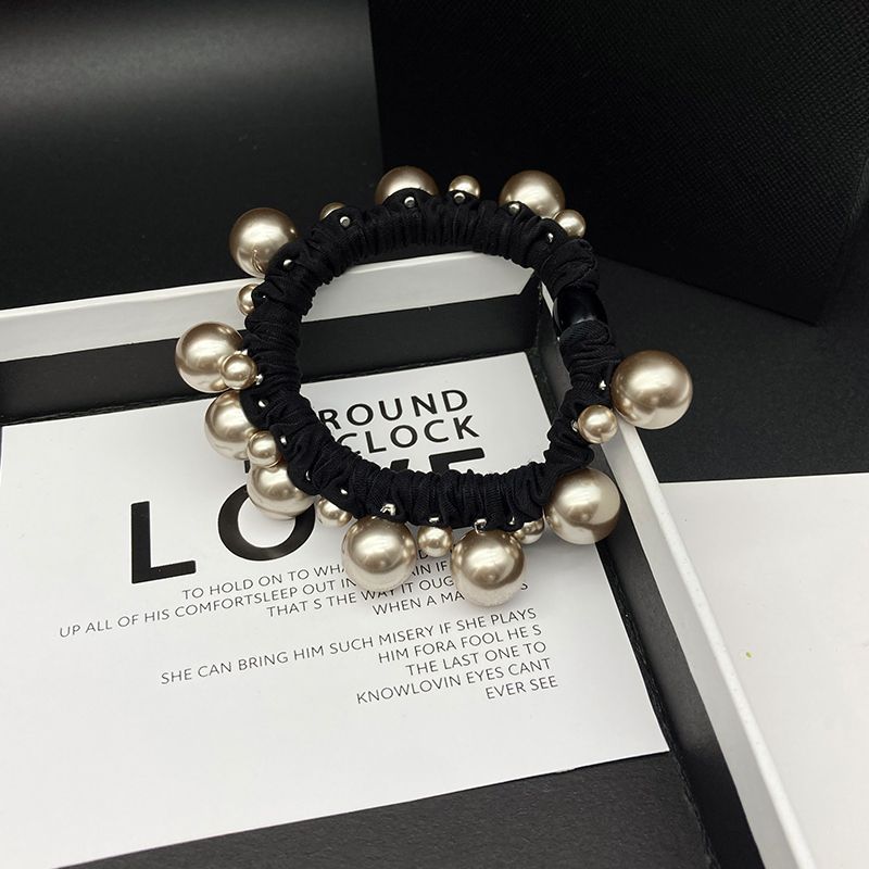 2025 nuevo estilo de cuerda de cabeza simple anillo de pelo de perlas anillo de intestino grande temperamento de alta elasticidad correa gruesa cuerda de pelo de mujer