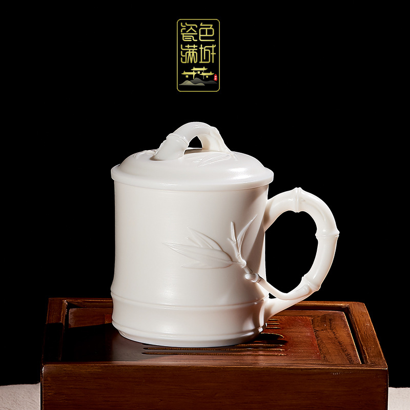 Porcelana color Mancheng Dehua porcelana blanca con tapa filtro oficina con revestimiento de separación taza de agua taza de té grande de cerámica personal