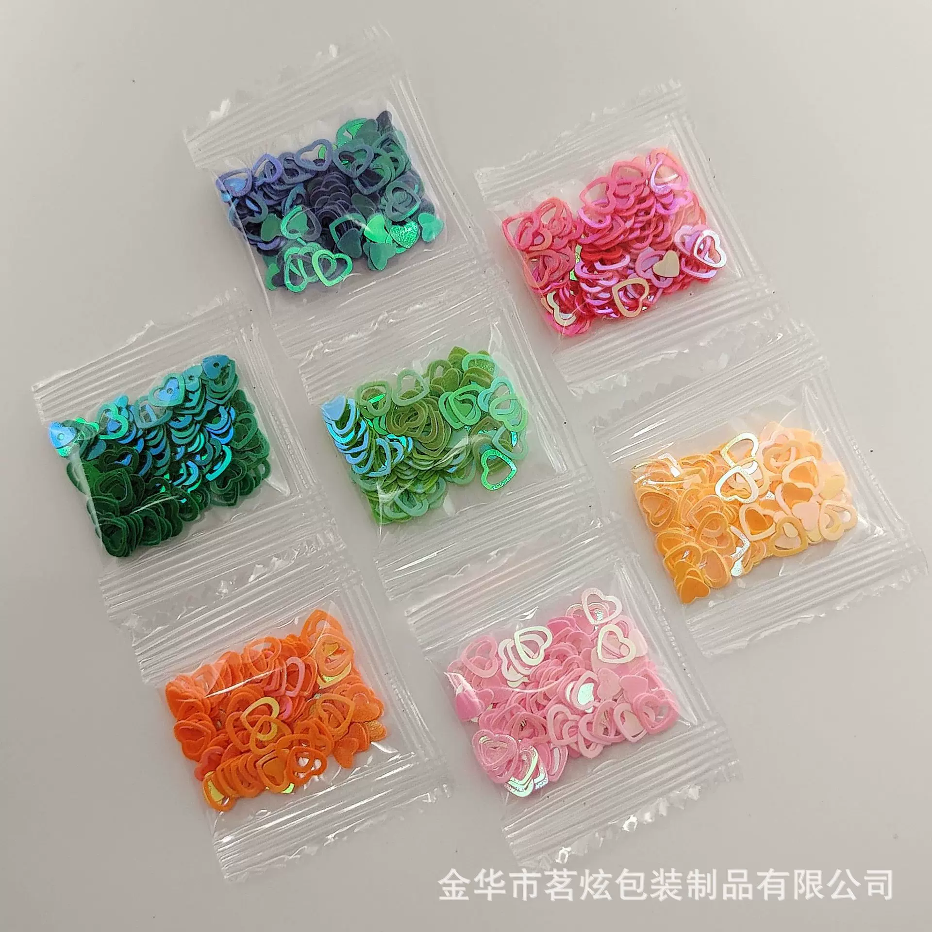 厂家直供炫彩镂空爱心pvc混合美甲亮片DIY手工配件饰品1克批发