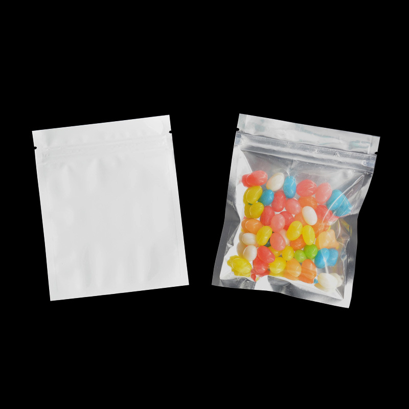 Transfronterizo de color brillante Chapado en aluminio Yin y Yang hueso translúcido bolsa autosellante accesorios de maquinaria de hardware bolsa de sellado 100 piezas Precio