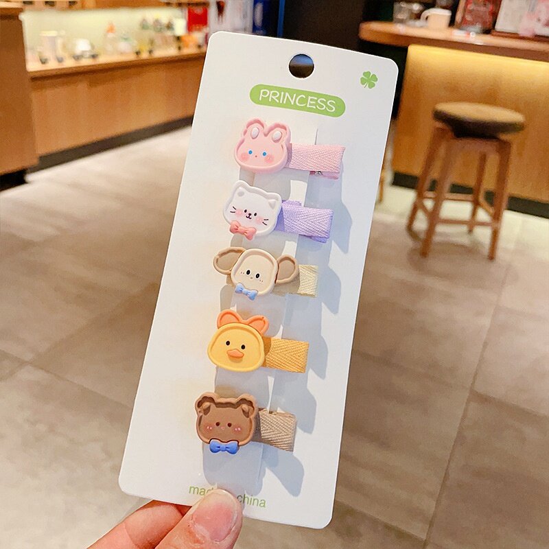 Hermosos clips de cabello de color para niños coreanos de alto nivel sensación de arco de niñas bolsa de tela no daña clips de cabello de bebé