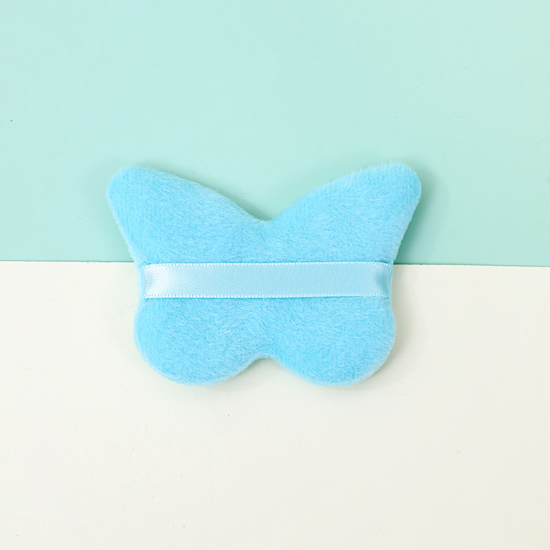 La borla de flocado corto en forma de mariposa transfronteriza no come polvo esponja de terciopelo de pie polvo suelto maquillaje maquillaje maquillaje algodón fábrica personalizado al por mayor